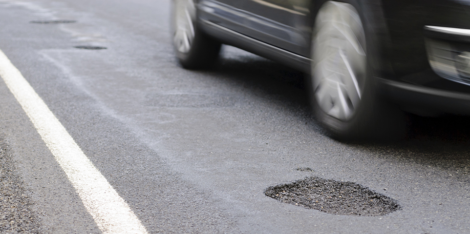Does my auto insurance cover damage caused by potholes? | III